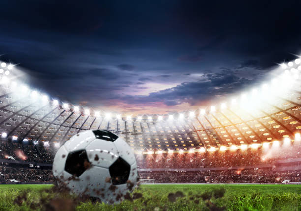 Soccer ball lies on stadium grass in the smoke, 3D Illustration